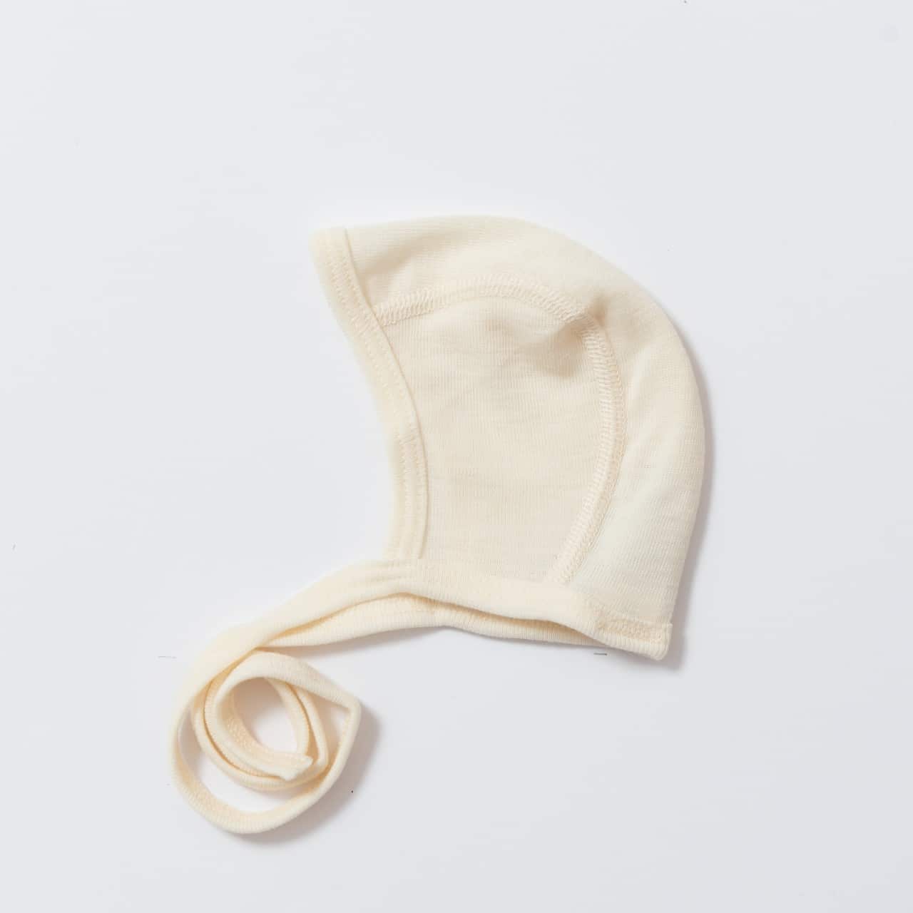 Bonnet de naissance en laine mérinos bio – naturel Cosilana